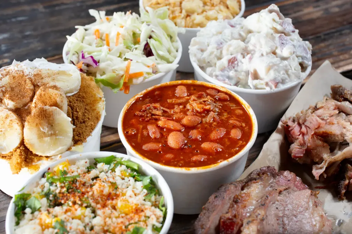 Assorted smoked meats and sides.